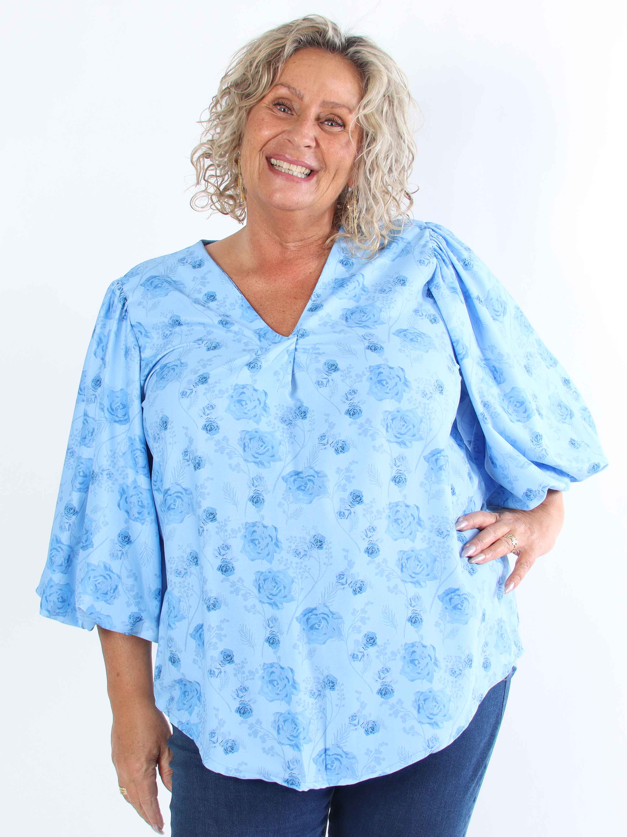 Lenora - Blommig plus size-tunika med puffärmar